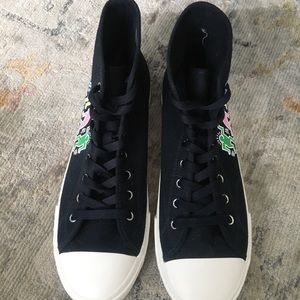 Keith Haring High top sneakers.